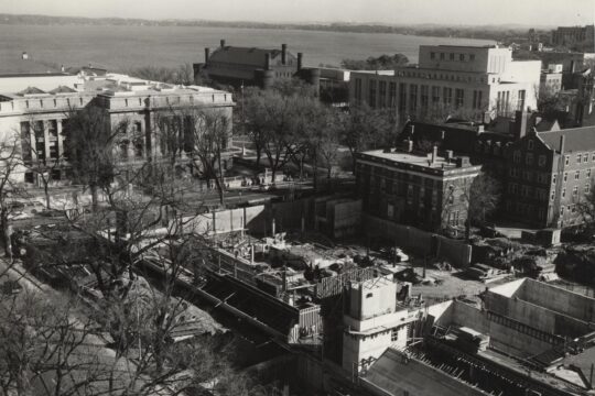 Campus aerial showing Historical Society, Memorial Union and construction site of what will become Humanities building.
