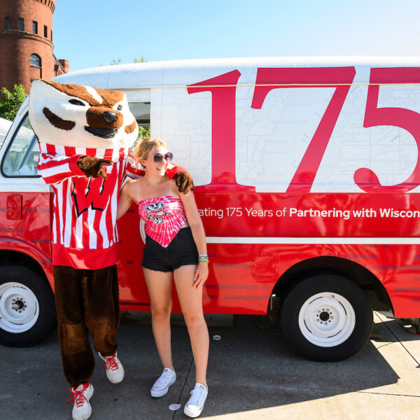 Bucky and guest pose in front of 175th anniversary–inspired ice cream truck.
