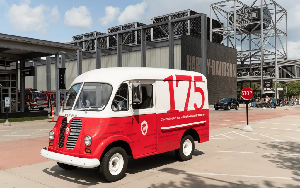 Red and white 175 truck in front of Harley Davidson Museum