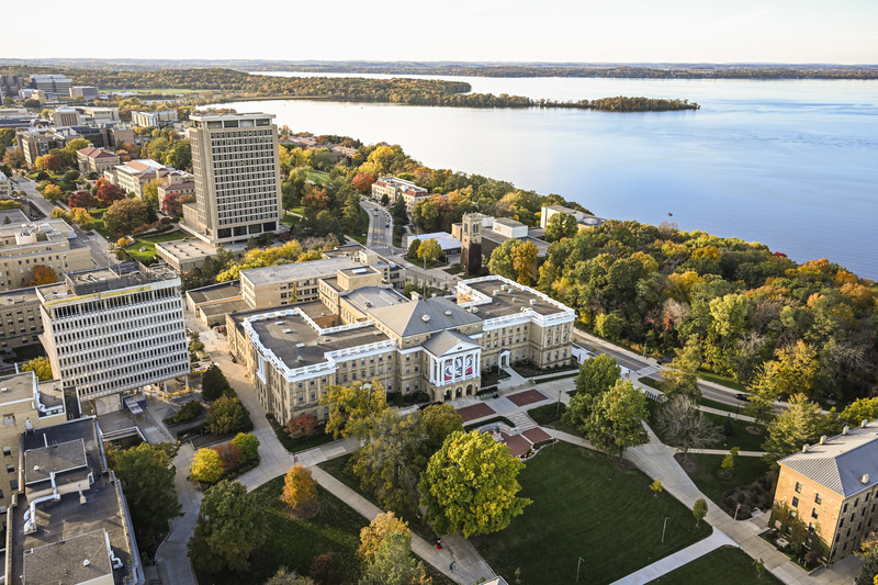 An aerial shot of campus, featuring the lake and Bascom Hall.