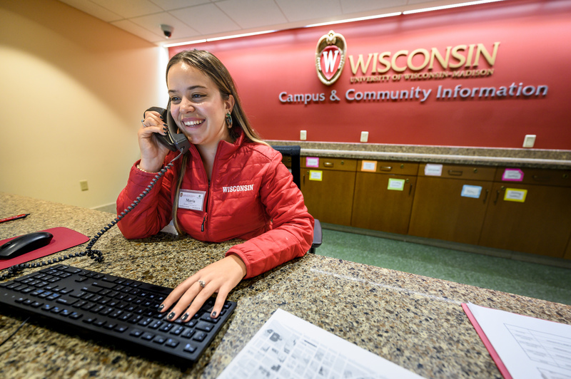A photo of a student sat at the Memorial Union CAVR information desk.