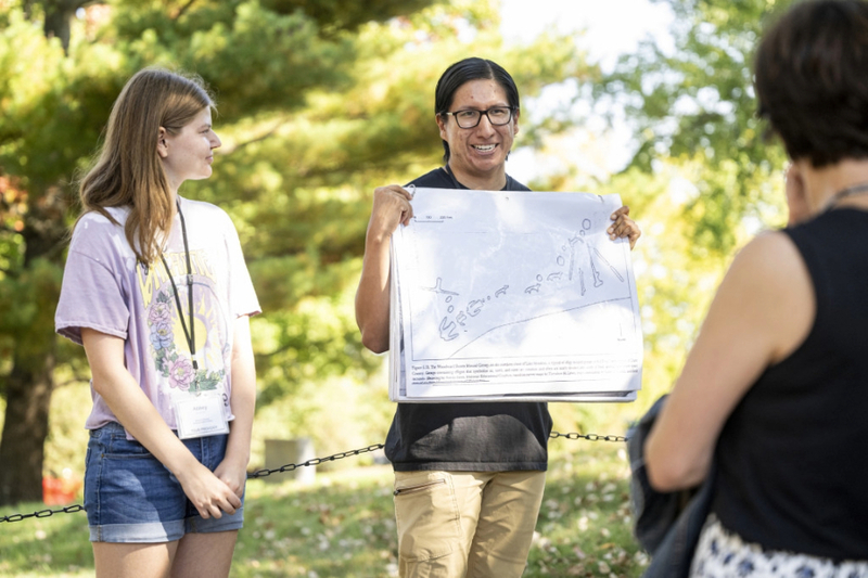 First Nations Cultural Landscape Tour guides Abbey Woldt and Kane Funmaker speak to burial mounds located on the north shore of Lake Mendota.
